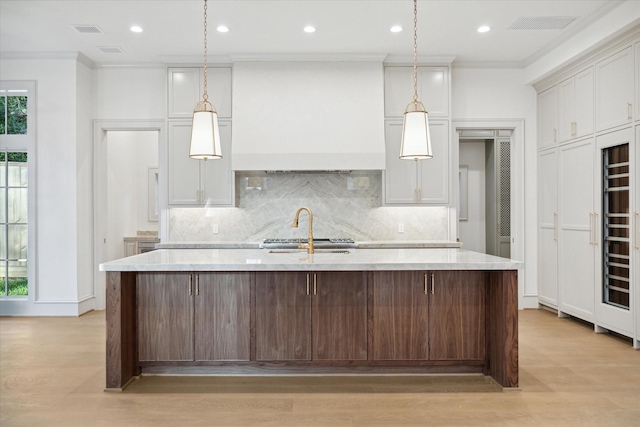 kitchen with hanging light fixtures and a large island