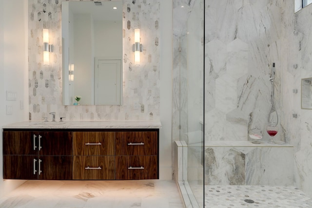 bathroom with a shower and vanity