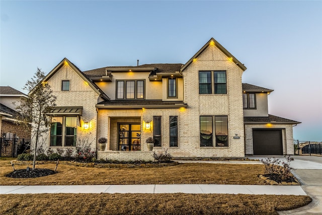 view of front of property featuring a garage