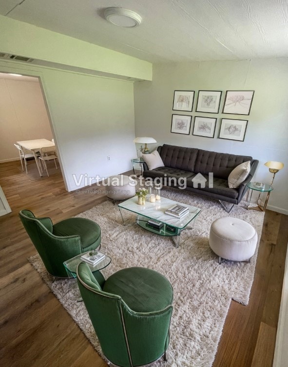 living room featuring dark hardwood / wood-style flooring