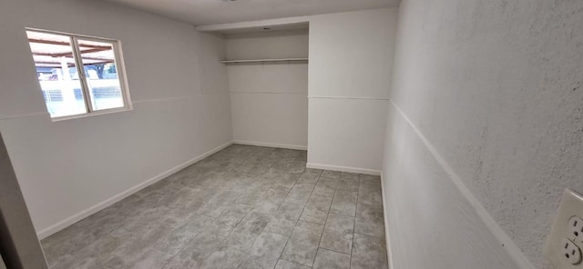 unfurnished bedroom featuring a closet