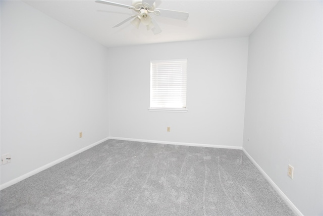 unfurnished room featuring carpet floors and ceiling fan