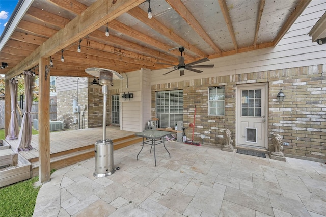 view of patio with ceiling fan and a wooden deck