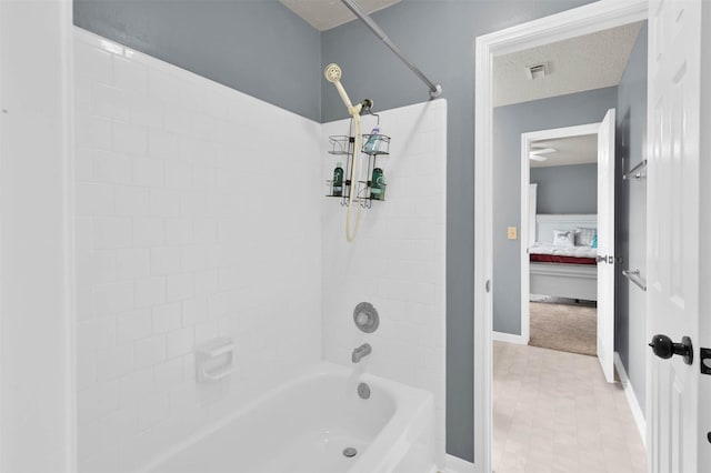 bathroom with shower / bath combination