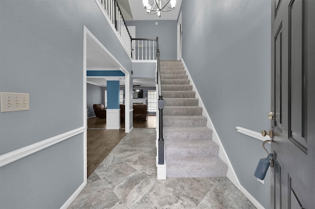 foyer with a notable chandelier