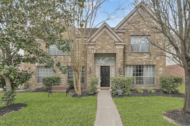 view of front of home featuring a front lawn