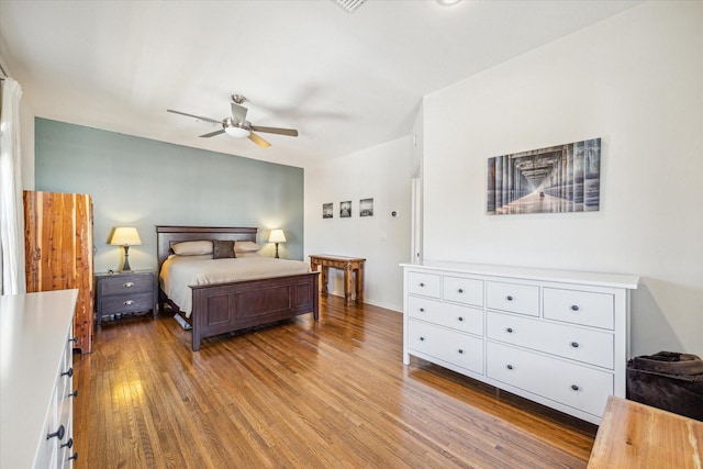 bedroom with ceiling fan and light wood-type flooring