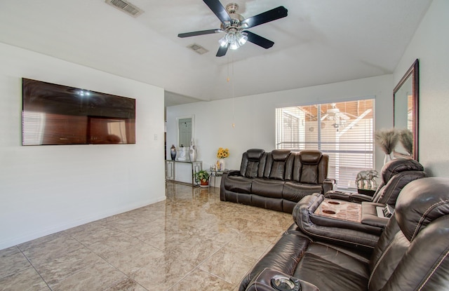 living room with ceiling fan and lofted ceiling