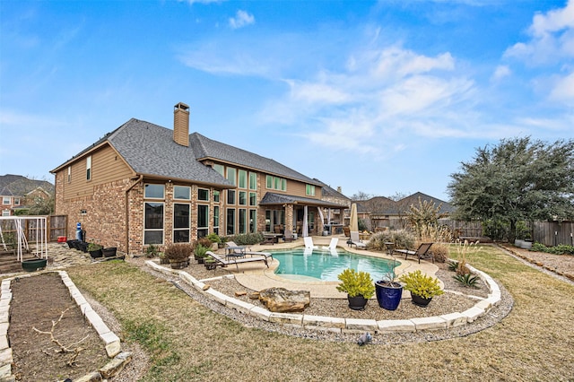 view of swimming pool with a patio