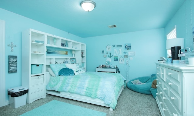 bedroom with light colored carpet