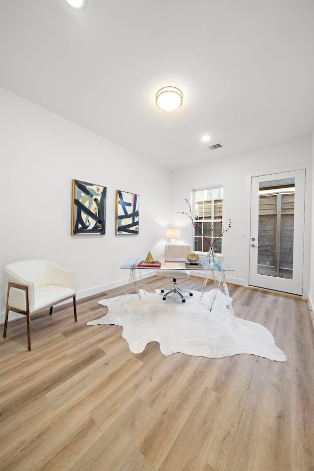 office area featuring light wood-type flooring