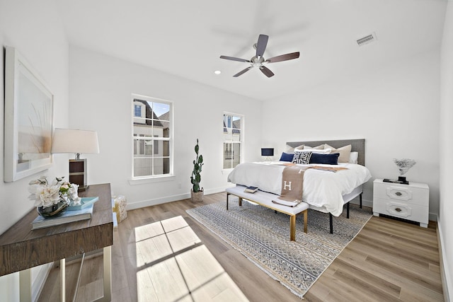 bedroom featuring hardwood / wood-style floors and ceiling fan