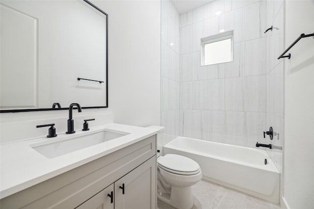 full bathroom featuring tile patterned floors, vanity, toilet, and tiled shower / bath combo