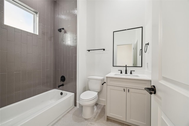 full bathroom featuring vanity, toilet, tiled shower / bath combo, and tile patterned flooring