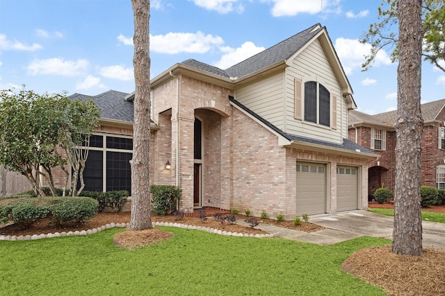 front of property with a garage and a front yard