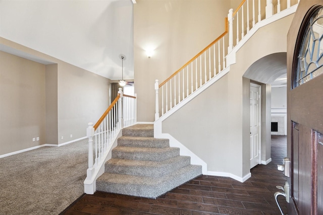 staircase with ceiling fan