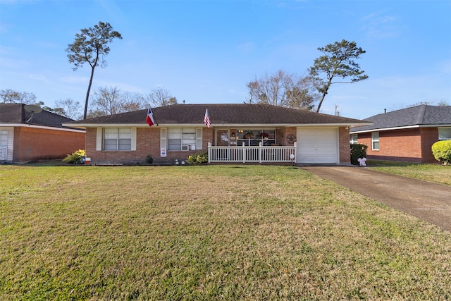 single story home featuring a garage, a front lawn, and a porch