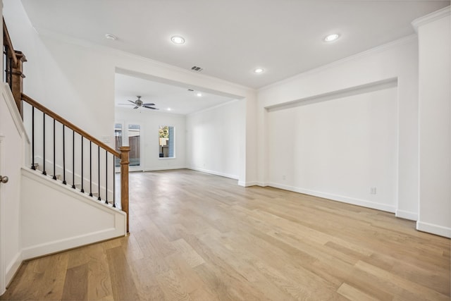 unfurnished living room with crown molding, light wood-type flooring, and ceiling fan