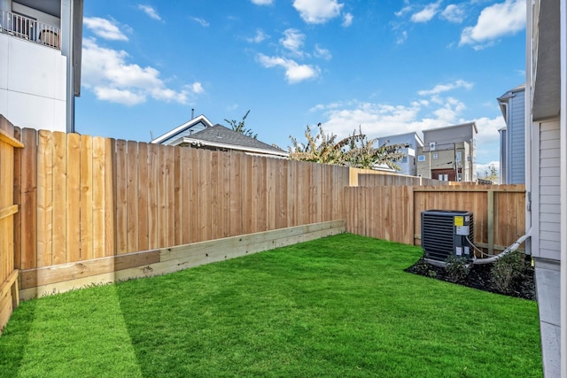 view of yard featuring central AC unit