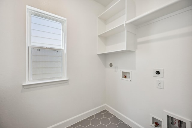 clothes washing area with washer hookup, hookup for a gas dryer, and hookup for an electric dryer