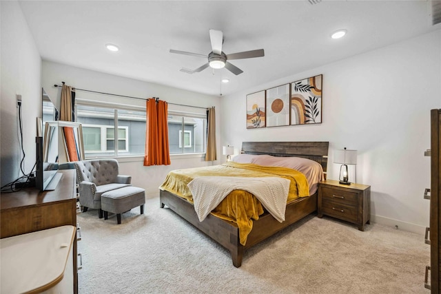 bedroom featuring baseboards, ceiling fan, recessed lighting, and light colored carpet