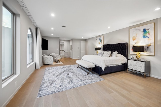 bedroom with light wood-type flooring