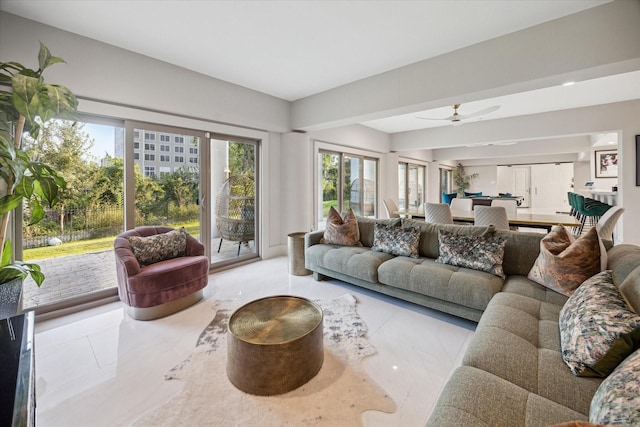 living room featuring ceiling fan