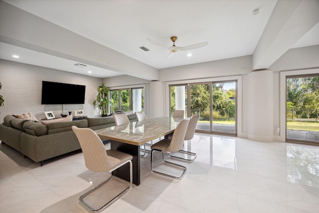 dining space featuring ceiling fan and a wealth of natural light