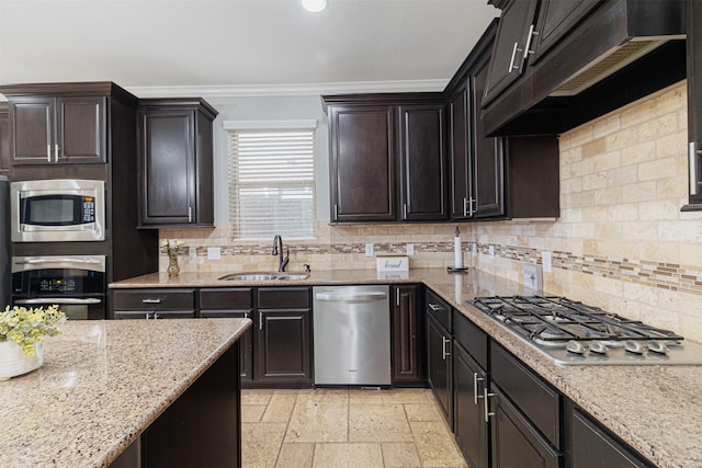 kitchen with custom exhaust hood, stainless steel appliances, decorative backsplash, sink, and crown molding