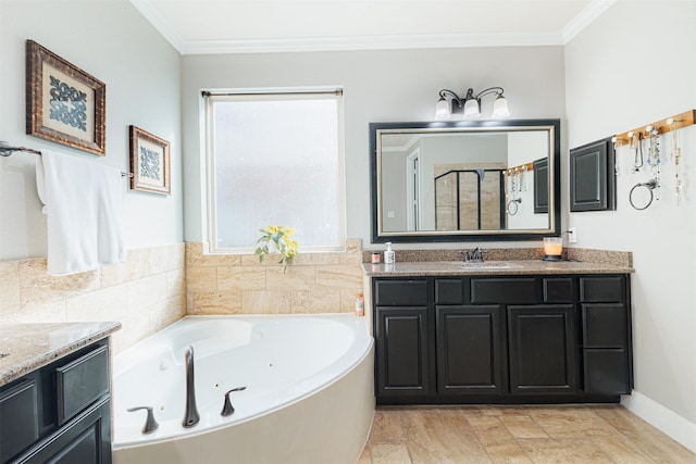 bathroom featuring vanity, ornamental molding, and independent shower and bath