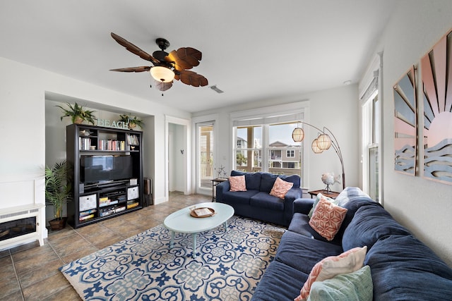 living room with ceiling fan