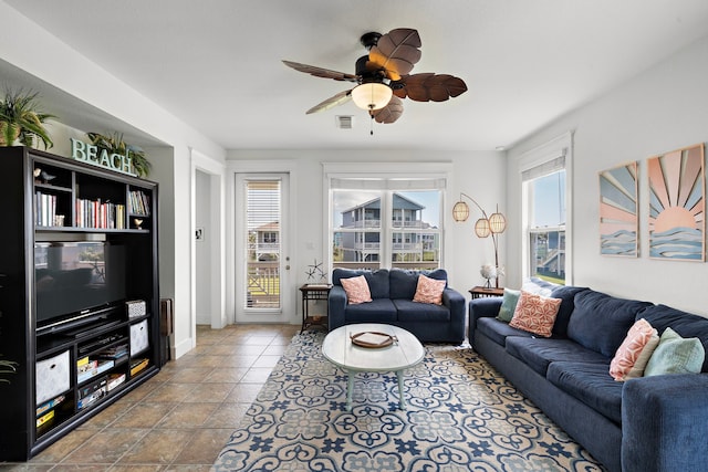 living room featuring ceiling fan