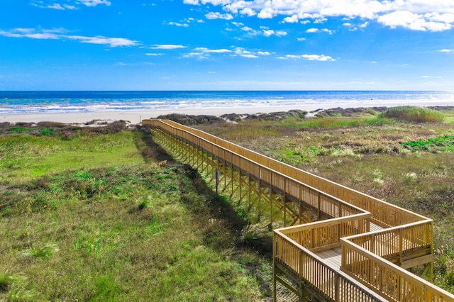 view of water feature with a beach view