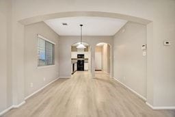 interior space with hardwood / wood-style floors