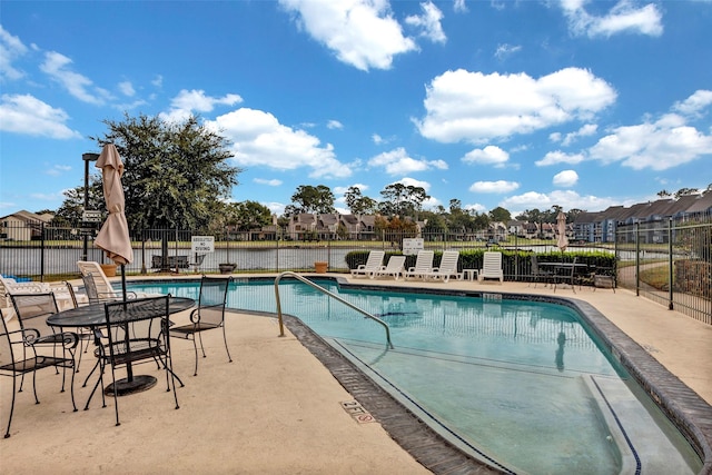 view of pool featuring a patio area