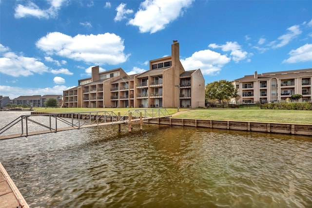 property view of water with a dock