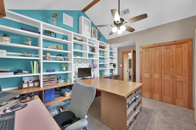 office featuring ceiling fan, vaulted ceiling, and light carpet