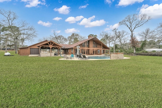 back of property featuring a gazebo, a lawn, and a patio