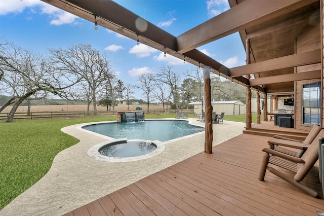 view of swimming pool featuring a lawn, an in ground hot tub, pool water feature, and a deck