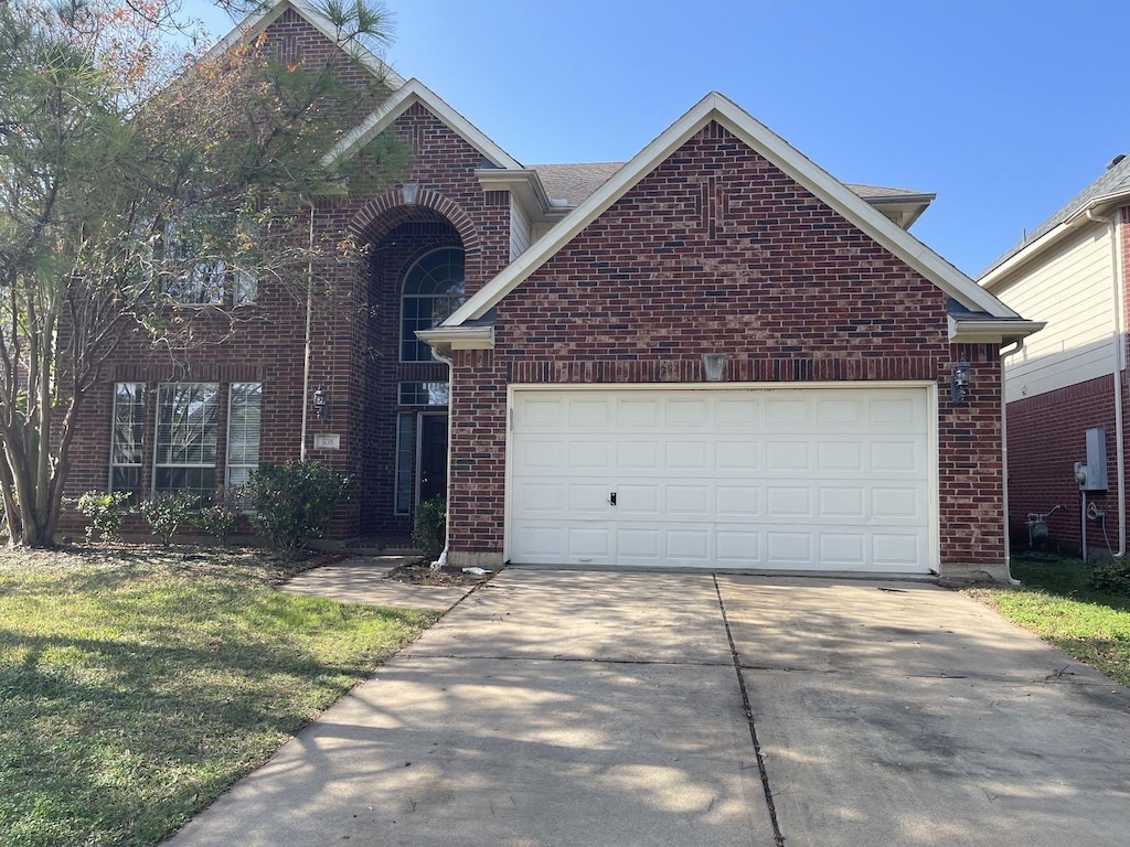 view of property featuring a garage