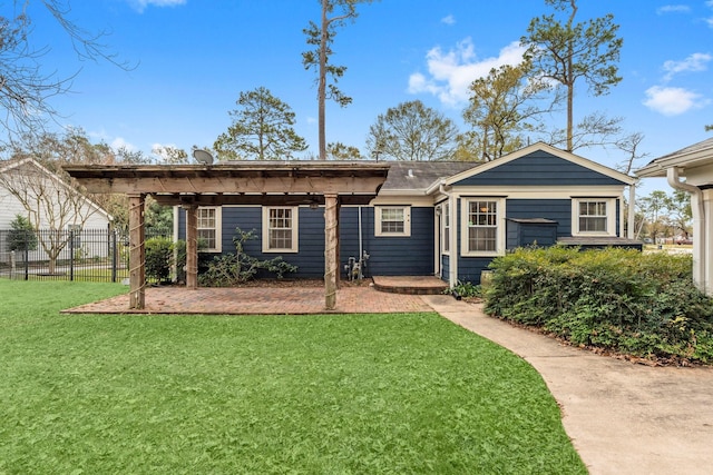 ranch-style house with a front yard and a pergola