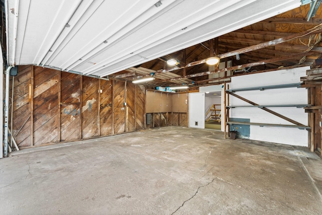 garage with wood walls