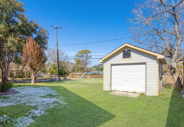 garage with a lawn