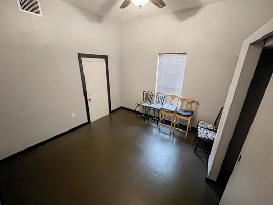 interior space featuring ceiling fan