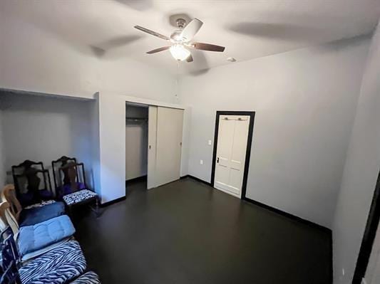 interior space featuring ceiling fan