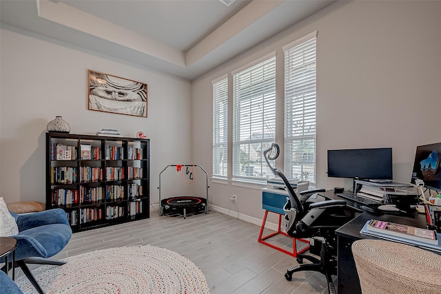 home office with a tray ceiling