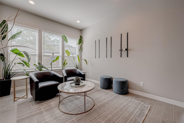 living area with light hardwood / wood-style floors