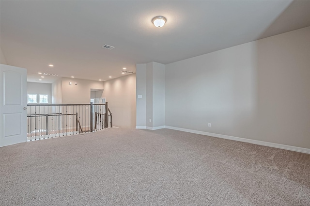 empty room featuring carpet floors