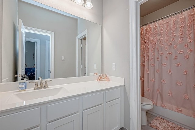 full bathroom featuring vanity, shower / tub combo, tile patterned floors, and toilet