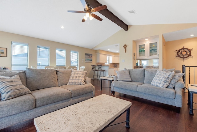 living room featuring dark hardwood / wood-style floors, vaulted ceiling with beams, and ceiling fan